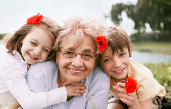 happy grandmother with grandchildren